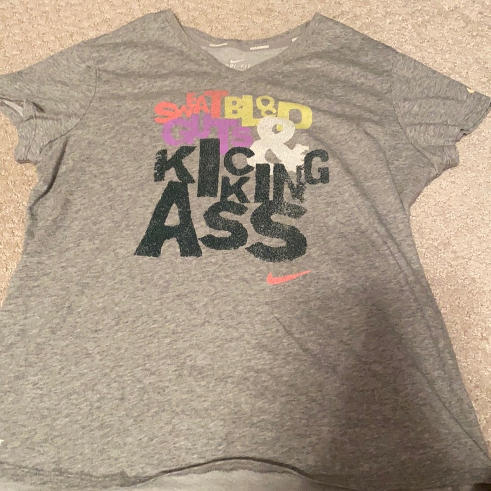 Gray, vintage nike running t-shirt. Bright colorful words on the front.